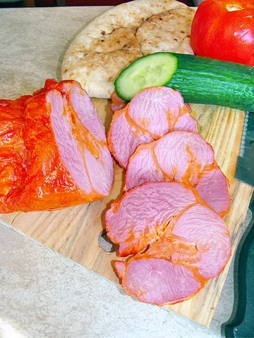 turkey ham: a processed food made primarily from cooked or cured turkey meat and water, formed into the shape...