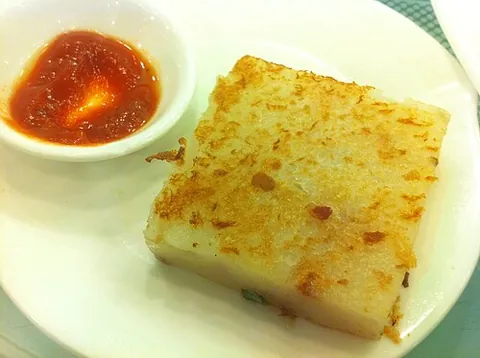 turnip cake: a savoury Chinese dim sum dish made with radish and usually pan-fried
