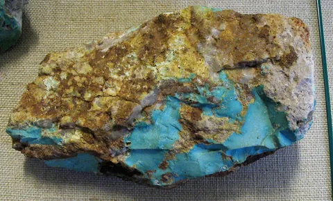 turquoise: a sky-blue, greenish-blue, or greenish-gray semi-precious gemstone