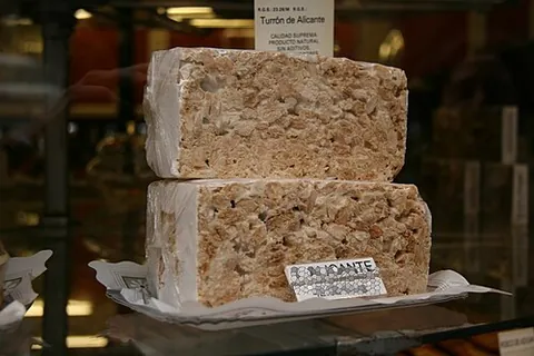 turron: a Spanish form of nougat made from almonds and honey