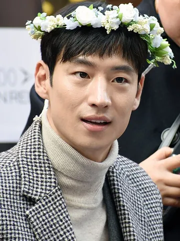 turtleneck sweater: a sweater with a turtleneck collar