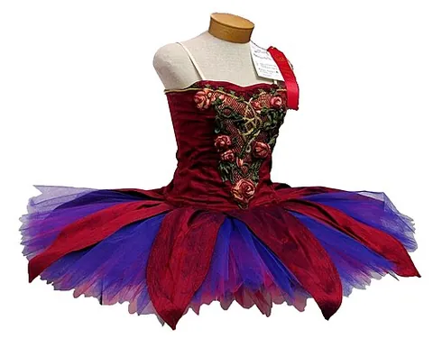 tutu: a ballet skirt made of layered stiff but light netting