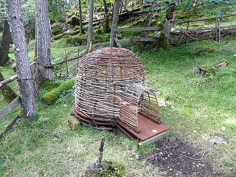twigloo: a temporary circular shelter or structure built from thin branches
