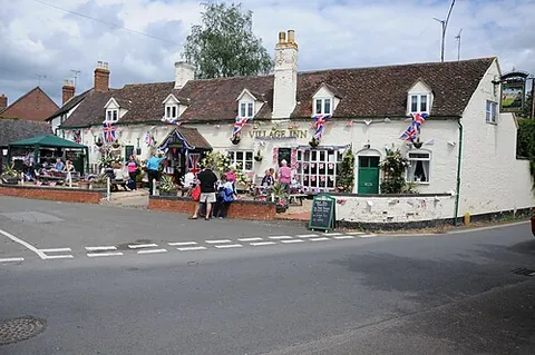 twyning: a village and civil parish in Tewkesbury district, Gloucestershire, England, surrounded on three...