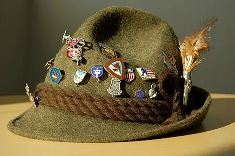 tyrolean hat: a kind of green felt hat with the crown tapering to a point, originally from the Tyrol in the Alps