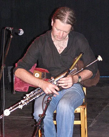 uilleann pipes: the bagpipes of Ireland, which have a bellows strapped around the wrist and arm to inflate the bag...