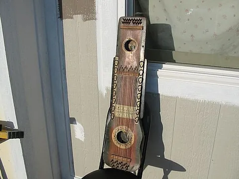 ukelin: a musical instrument resembling a ukelele and violin