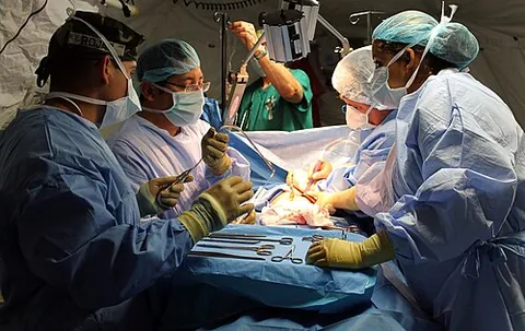 under the knife: chiefly preceded by a form of go: undergoing a surgical procedure; into surgery