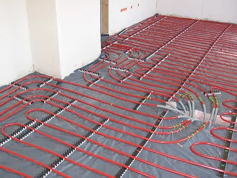 underfloor heating: any of various central heating (and sometimes cooling) systems that achieve indoor climate control...