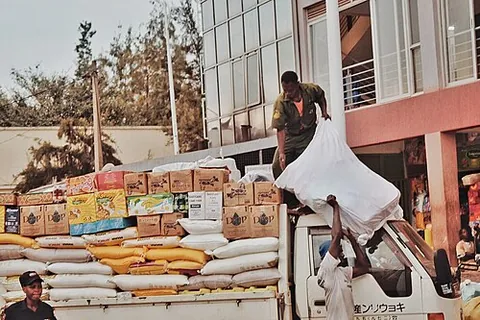 unload: to remove the load or cargo from (a vehicle, etc.)