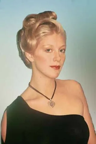 updo: a woman's hairdo in which most hair is kept above the neck