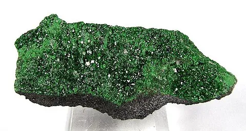 uvarovite: a rare chromium-bearing garnet mineral with a vivid emerald-green colour