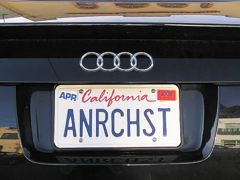 vanity plate: a license plate whose identifier is chosen by the registering owner, usually to suggest a word or...