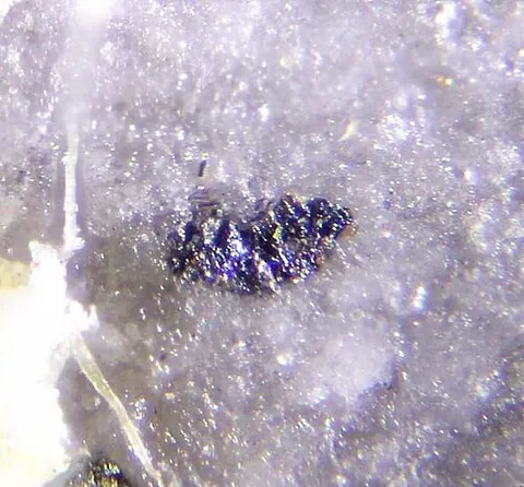 vaughanite: a mineral containing mercury, sulfur, antimony and thallium that is found in Canada