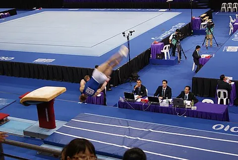 vaulting table: an apparatus featuring a flat, large, and cushioned surface almost parallel to the floor sloping...