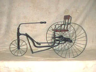 velocipede: an early two-wheeled conveyance upon which one rode astride a wooden frame propelled by means of...