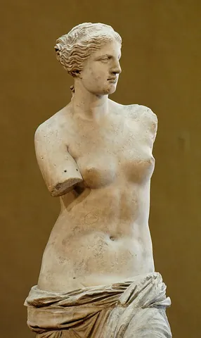 venus de milo: an ancient Greek sculpture believed to depict Aphrodite (Venus to Romans)