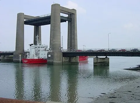 vertical-lift bridge: a type of lifting bridge for road and/or rail traffic where the span is lifted at both ends,...