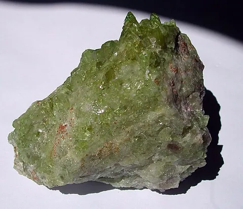 vesuvianite: a yellow, green or brown mineral, a mixed calcium, magnesium and aluminium silicate sometimes used...