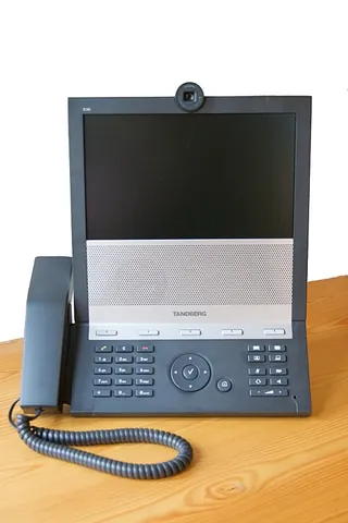 videophone: a telephone capable of transmitting both audio and video signals in both directions