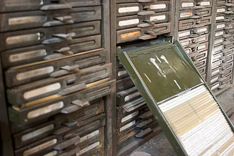 visible file: a pre-computer filing method in which cards are arranged in shallow drawers so that a portion of...