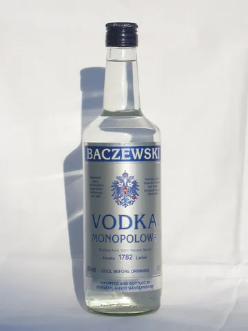 vodka: a clear distilled alcoholic liquor made from grain mash
