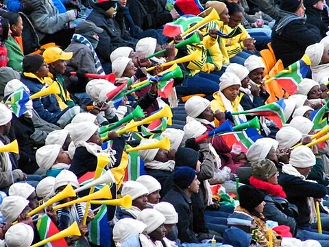 vuvuzela: a trumpet-shaped horn, now usually plastic, that produces a loud buzzing sound