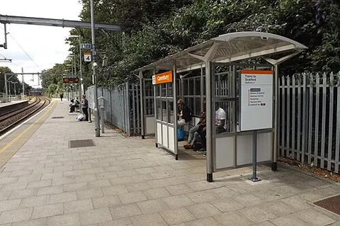waiting shelter: a small roofed structure where intending passengers can wait for a train or bus to arrive