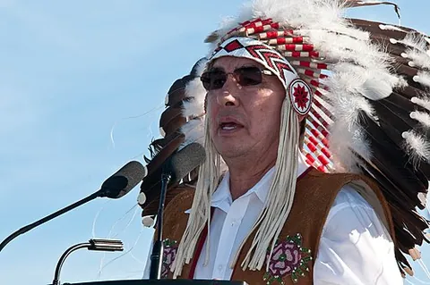 war bonnet: a ceremonial headdress, decorated with a trailing extension of eagle feathers, worn by some Native...