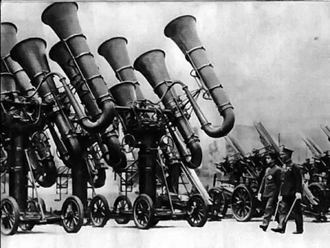 war tuba: an acoustic locator, vaguely resembling a tuba, used (by Japan during the World Wars) to provide...
