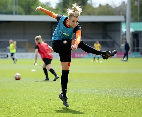 warm-up: the act of exercising or stretching in preparation for strenuous activity