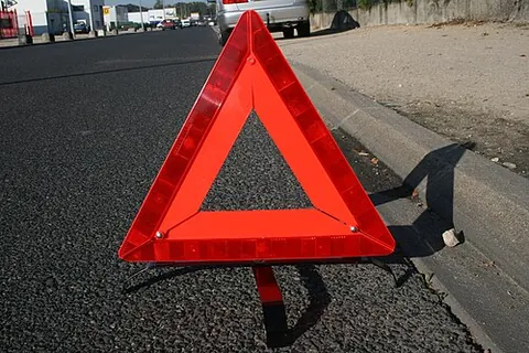 warning triangle: a triangle made of (usually) red reflective material, used to warn other road users of a...