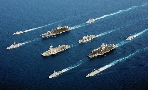 warship: any ship built or armed for naval combat
