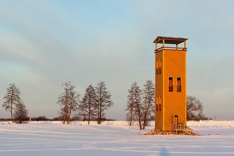 watchtower: an observation tower in which a lookout keeps watch over prisoners, or looks out for fires, etc