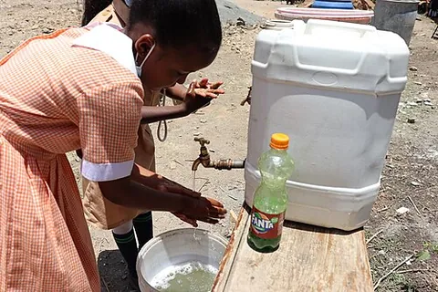 water camper: a portable canister for water typically with a tap