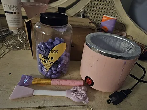 waxing: an act of applying wax