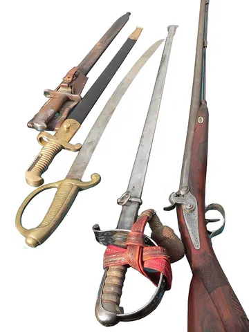 weapon: an instrument of attack or defense in combat or hunting, e.g. most guns, missiles, or swords