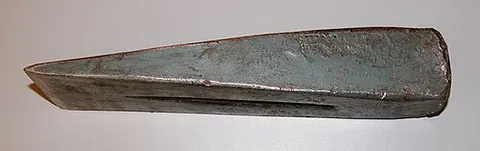 wedge: one of the simple machines; a piece of material, such as metal or wood, thick at one edge and...