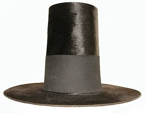 welsh hat: a tall hat, similar to a top hat, worn by women as part of traditional Welsh costume