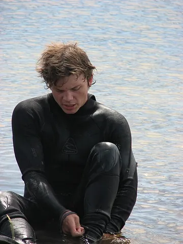 wetsuit: a close fitting, insulating garment usually made from neoprene or similar material designed to keep...