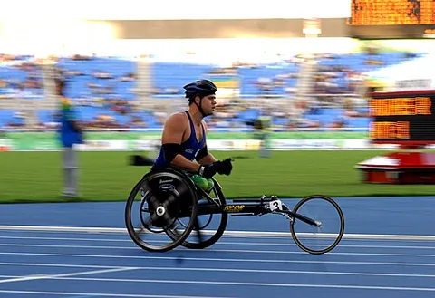 wheelchair racing: the racing of wheelchairs in track and road races