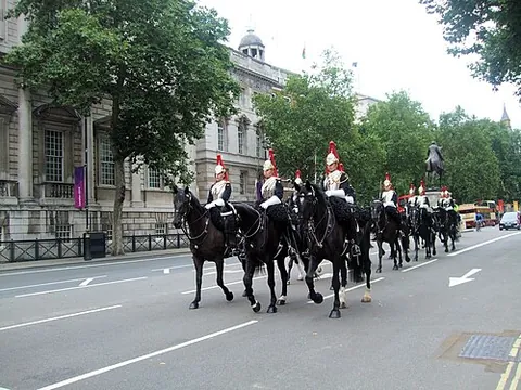 whitehall: a wide street in Westminster between Parliament Square and Trafalgar Square; it houses several...