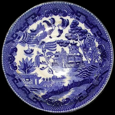 willow pattern: a distinctive and elaborate chinoiserie pattern used on ceramic tableware, depicting a...
