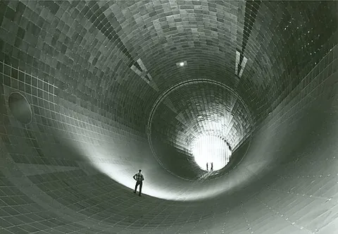 wind tunnel: a test facility through which air is forced in a controlled manner so as to study the effects of...