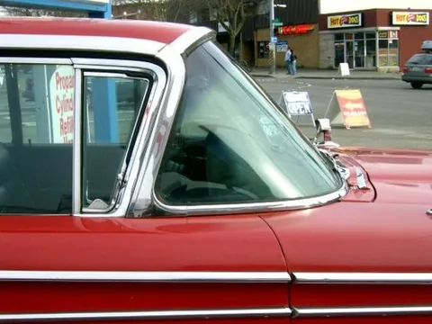 windshield: a transparent screen made of glass, located at the front and back of a vehicle in front of its...