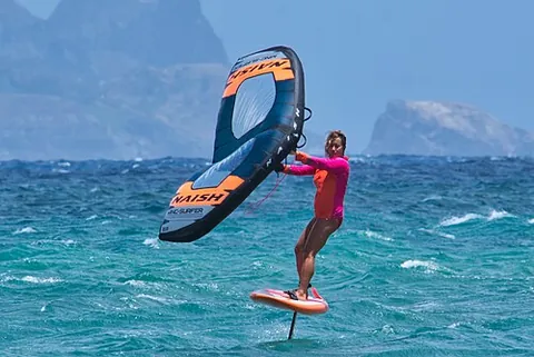 wing foiling: a surface watersport where a rider uses a lightweight wing on a surfboard with a hydrofoil