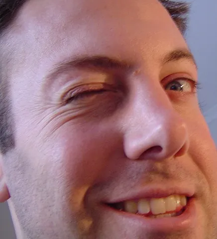 wink: to close one's eyes in sleep