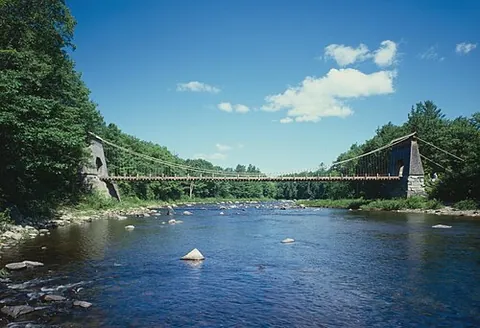 wire bridge: a bridge made principally of wire (specifically, wire rope)