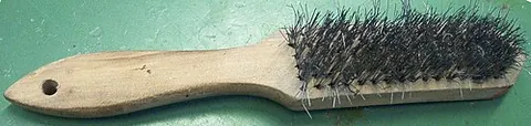 wire brush: a brush that has bristles made of wire; used as an abrasive and on masonry etc; especially (when...