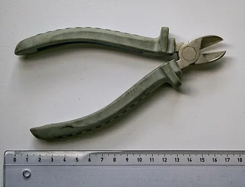 wire cutters: a hand tool resembling pliers, intended for cutting wires